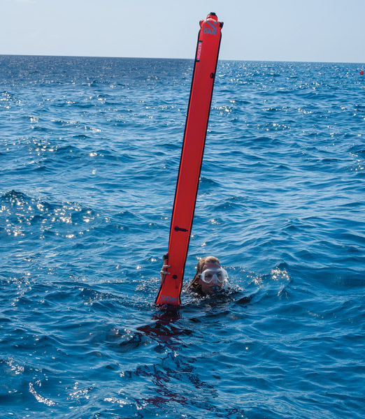 scuba diver with safety sausage